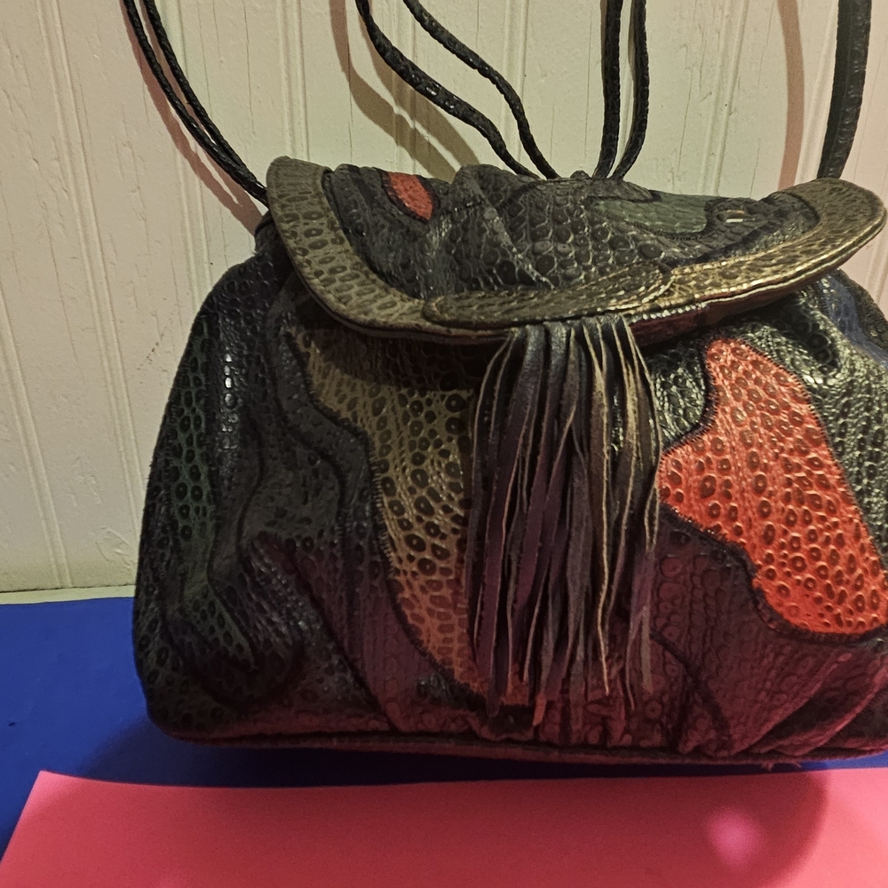 Vibrant Green and Red Crossbody Bag with Nature-Inspired Design
